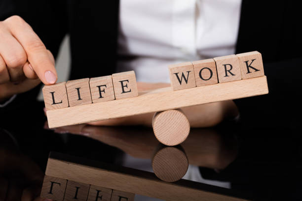 istock An Imbalance Between Life And Work On Seesaw 854435944