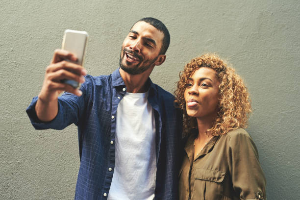 istock We have to take our couple selfie and post it 854446648
