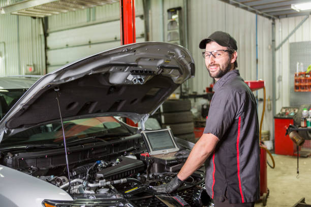 istock Mechanic working on car in his shop 854447050