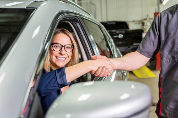 istock Customer in the garage with repair car 854450606