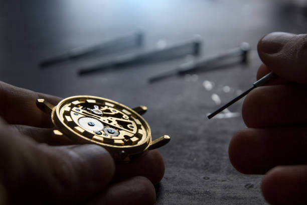 istock Watchmaker is repairing the mechanical watches in his workshop 854451178