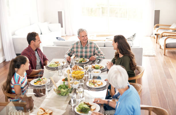istock Sitting down to lunch with the family 854451248