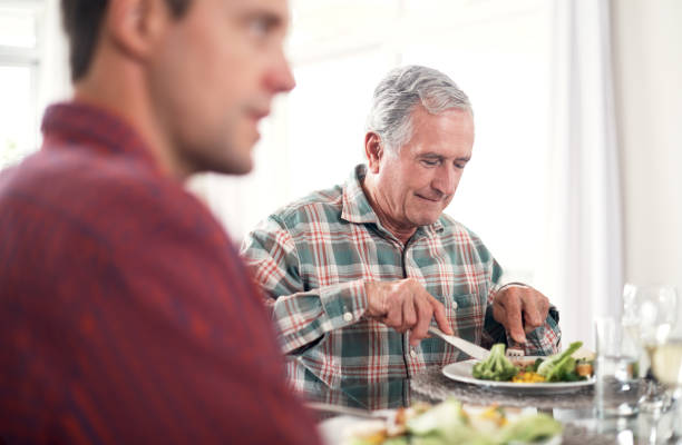 istock Enjoying a meal with his loved ones 854451426