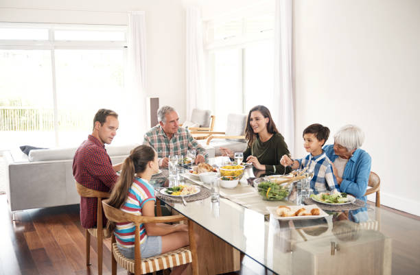 istock Sharing a meal with family 854451458