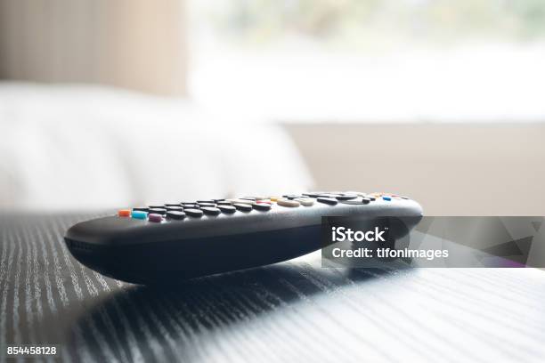 Tv Remote Control Stock Photo - Download Image Now - Remote Control, Close-up, Night Table