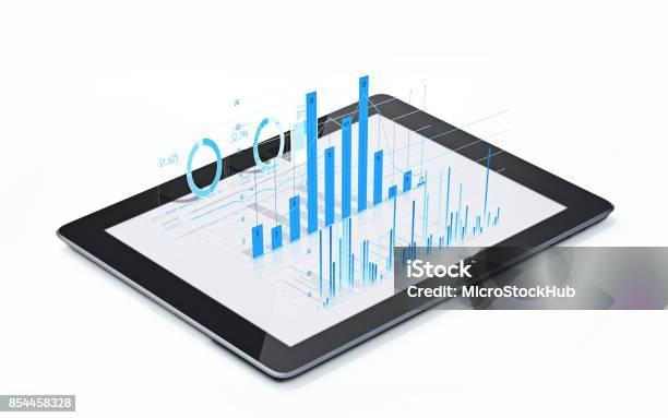 Financial Diagrams And Charts Being Projected From A Digital Tablet Stock Photo - Download Image Now