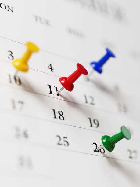 istock White Calendar With Colored Push Pins Showing Important Dates 854461062