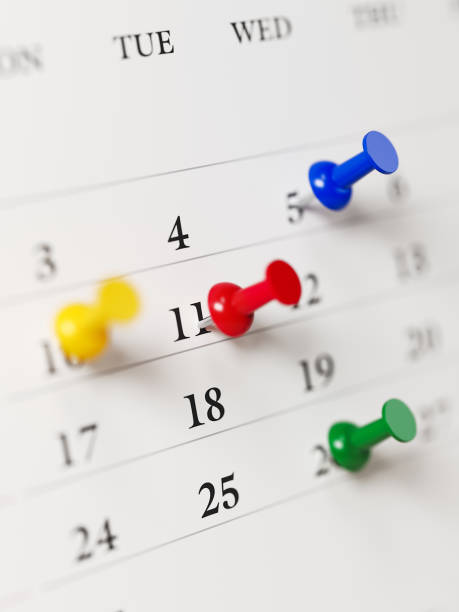 istock White Calendar With Colored Push Pins Showing Important Dates 854461250