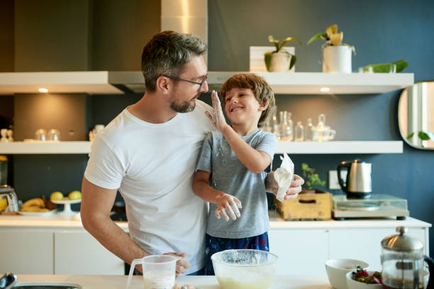 Dad, the flour's supposed to go in the batter