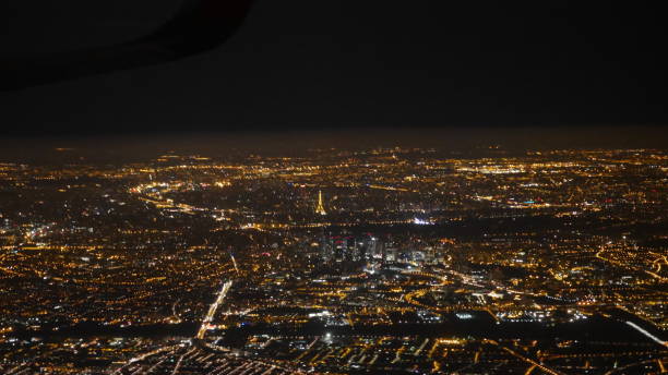istock light of bets at night through the window of a plane 854462730