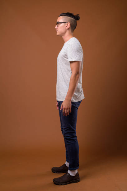 istock Studio shot of young handsome multi-ethnic man against colored background 854463090