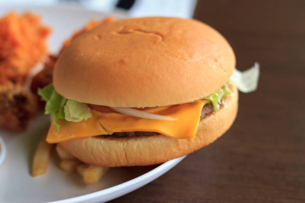 istock Close-up burger, burger select focus on a white plate, burger breakfast 854472150
