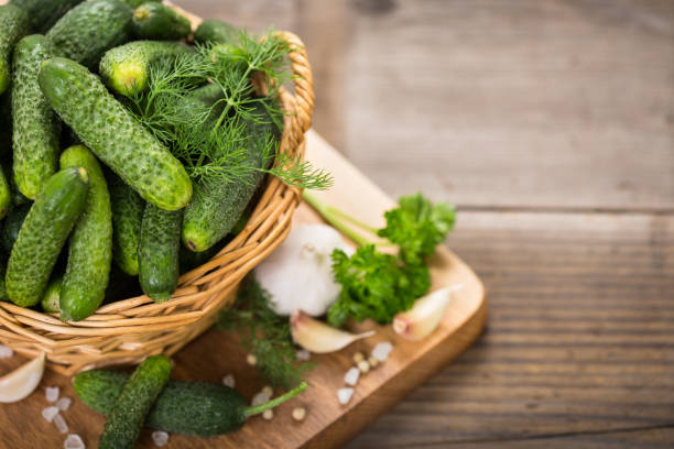 istock Fresh cucumbers in the basket 854473024
