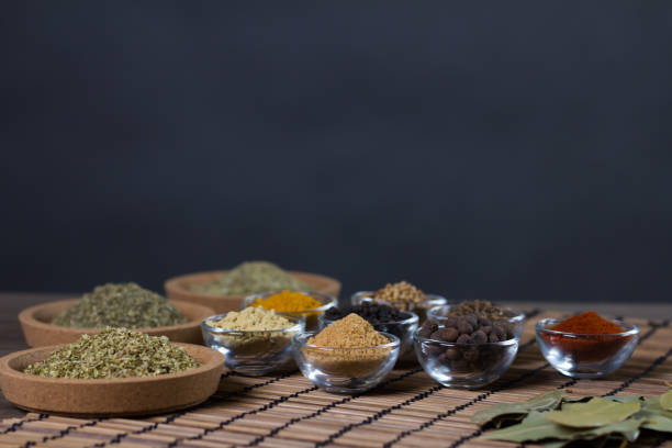 istock Various colorful spices on wooden table. Place for typography and logo 854474068