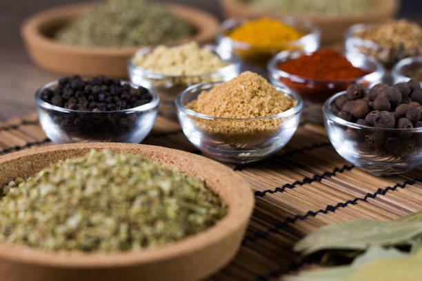istock Various colorful spices on wooden table. Place for typography and logo 854474182