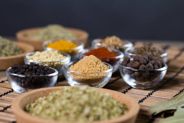 istock Various colorful spices on wooden table. Place for typography and logo 854474188