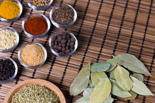 istock Various colorful spices on wooden table. Place for typography and logo 854474334