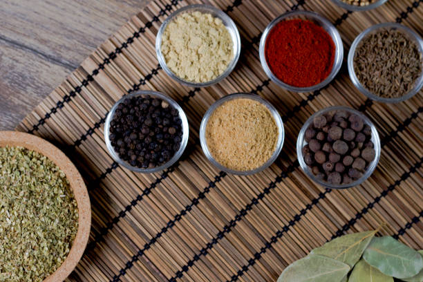istock Various colorful spices on wooden table. Place for typography and logo 854474356