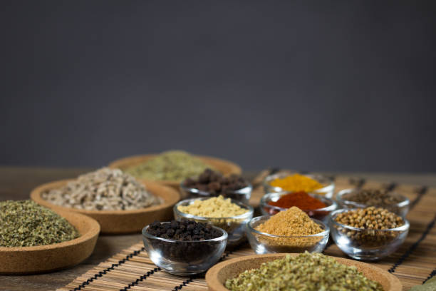 istock Various colorful spices on wooden table. Place for typography and logo 854478762