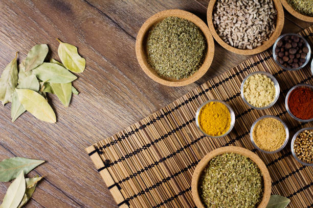 istock Various colorful spices on wooden table. Place for typography and logo 854479114