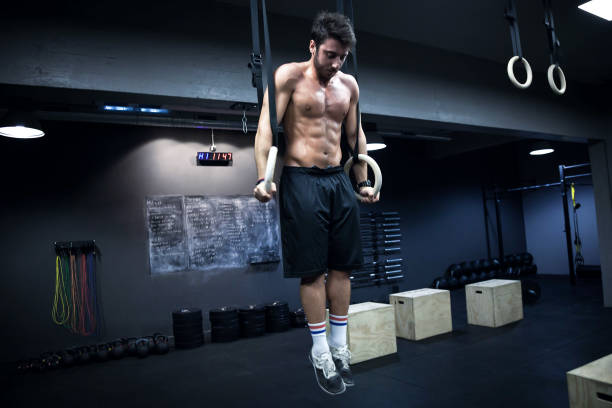 istock Gym fitness - Men Workout Gymnastic Ring 854480610