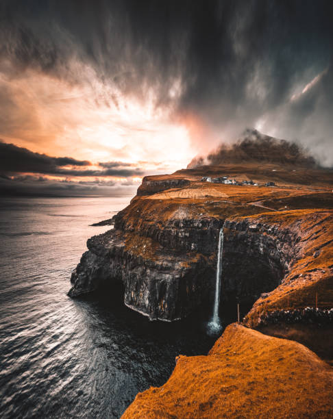 istock view of the Mulafossur waterfall in gasadalur 854480694