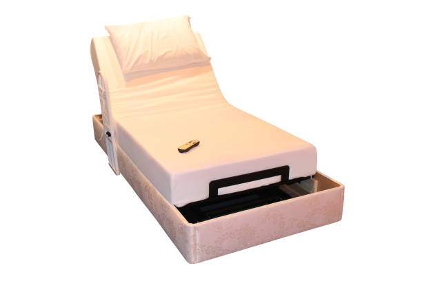 Adjustable Motorised Domestic Bed. A Remote Control Adjustable Motorised Domestic Bed. adjustable stock pictures, royalty-free photos & images