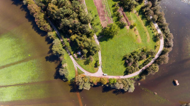 istock Aerial view of road surrounded with water. 854488786