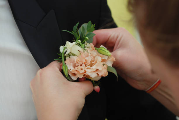 istock Wedding posy on the lapel of groom's jacket 854489468