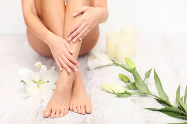 Woman in spa. Beauty treatment. Perfect skin. Pedicure.