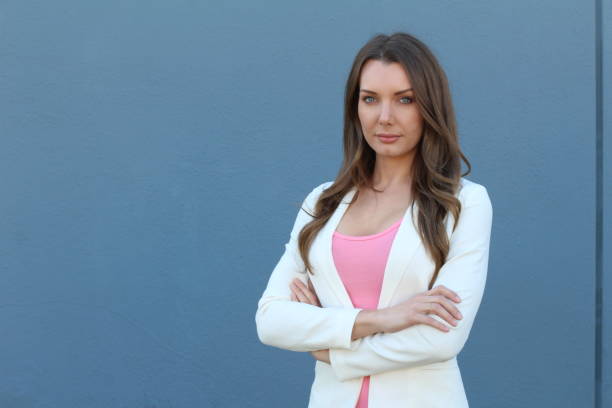 istock Powerful businesswoman isolated on blue 854498598