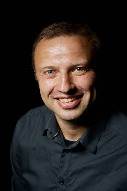 istock dark portrait of a young man 854499394