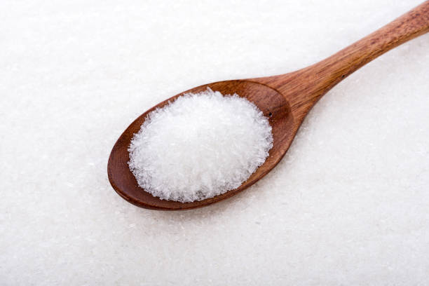 istock MonosodiumGlutamate (MSG or E621) on wooden spoon 854499952