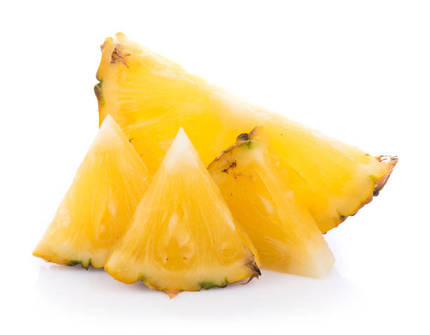 istock pineapple with slices isolated on white background 854502568