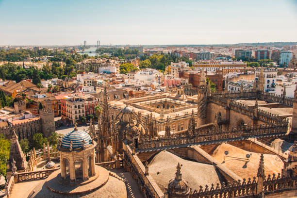 Seville Cathedral from Giralda tower Seville's cathedral as seen from Giralda Tower. santa cruz seville stock pictures, royalty-free photos & images