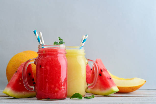 istock Watermelon and melon smoothie in  jars 854503912