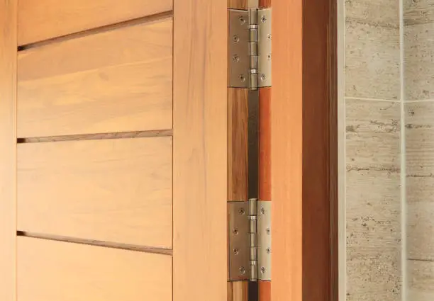 Photo of Wooden door with hinge