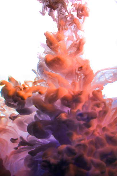 istock Acrylic colors and ink in water. Abstract frame background. Isolated on white 854510790
