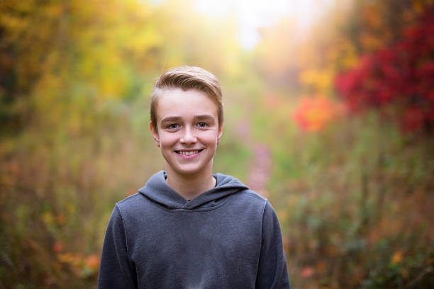 istock preteen boy in fall time 854513702