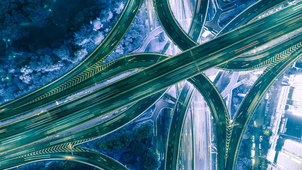 istock aerial view of highway interchange at night 854514586