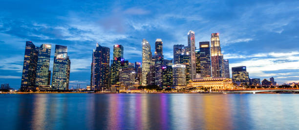 istock Singapore Skyline at Marina Bay During Sunset Blue Hour 854519582