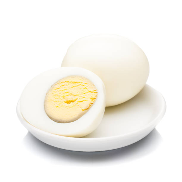 istock boiled sliced chicken eggs at small plate isolated on white background 854528762