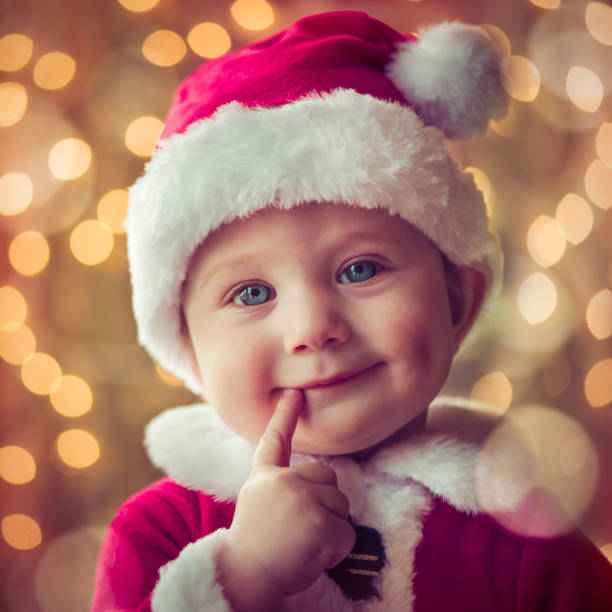 Happy child dressed as Santa