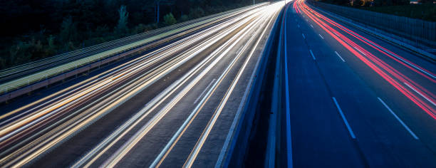 istock light trace from busy night traffic on the highway 854529662