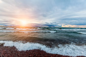 Sunset Over a Stormy Sea