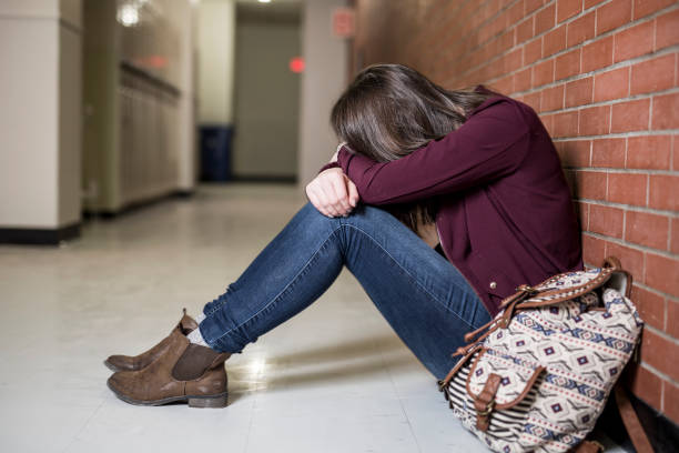 istock A Young depress female student at the college 854540072