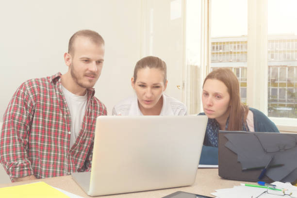 istock Two young woman working in the office. 854540322