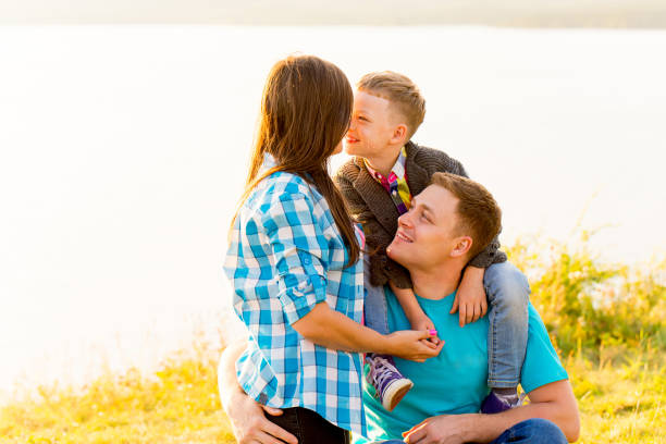 istock Family in a park 854550944