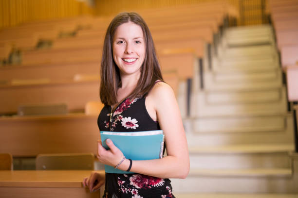 istock shot of a woman college student studying on campus 854553420