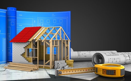 3d illustration of frame house with drawing roll over black background